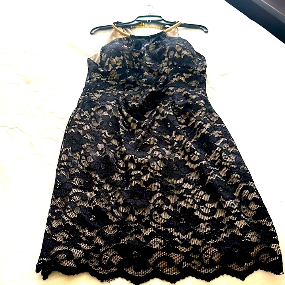 Eliza J dress, fits beautiful,sleeveless and for any  occasion. Size 12 lined ,